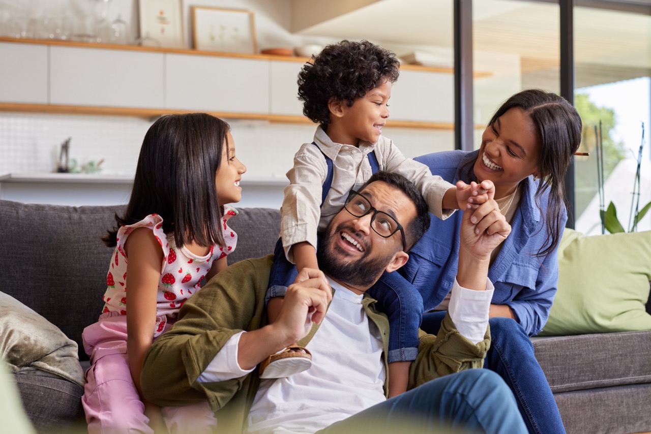 Happy,Multiethnic,Family,With,Little,Son,And,Daughter,Having,Fun